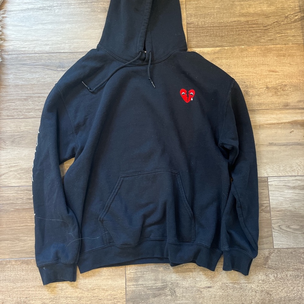 Black riot society hoodie with red pro jean heart. size medium